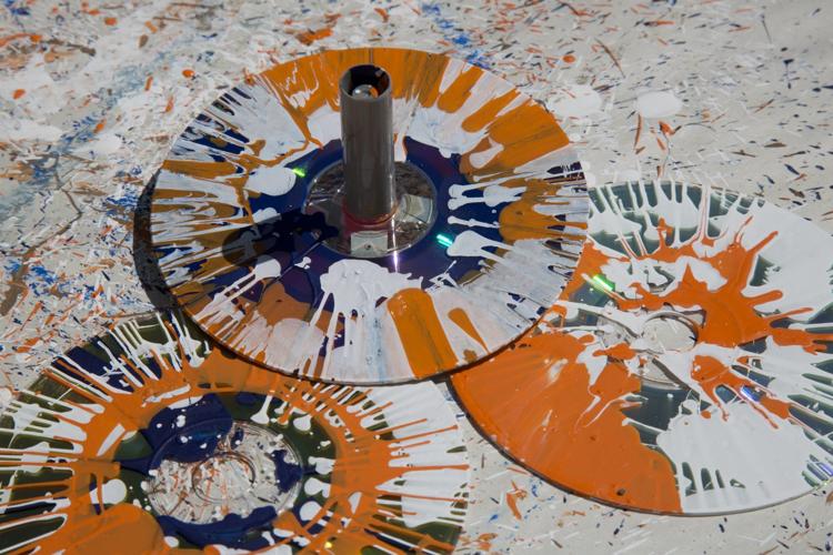 Spin art teaches kids about energy while having messy fun