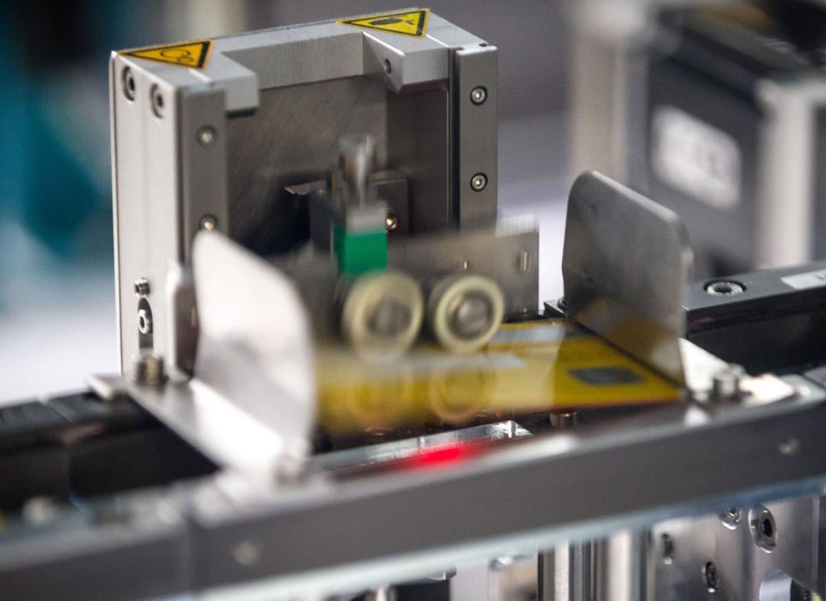 Laser Etched Credit And Debit Cards Begin To Replace Raised Type