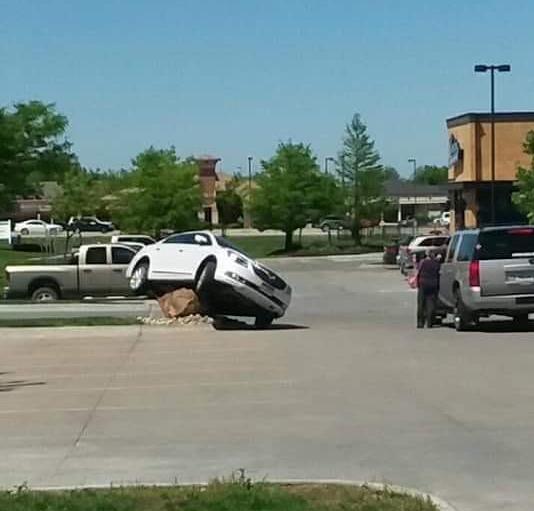 A true rock star Cars keep getting stuck on a famous boulder in Omaha