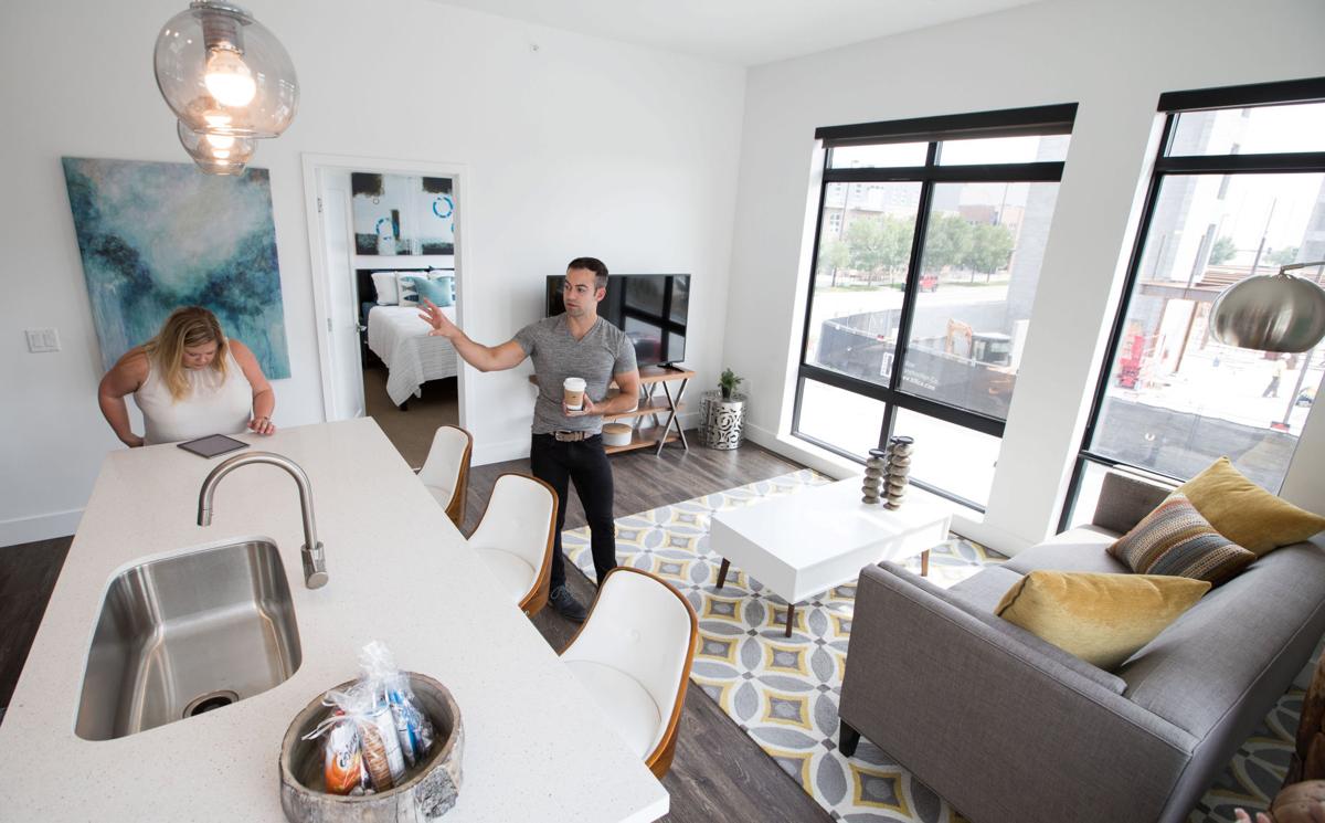 Touted As The First Of Their Kind In Omaha North Downtown Gabriel Gianes Of The Lund Co And Ashley Abel Property Manager Give A Tour Model Apartment At 1415 Yard Complex