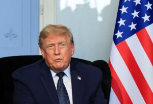 U.S. President Trump and French President Macron attend a bilateral meeting on the sidelines of the G7 summit, in Evian