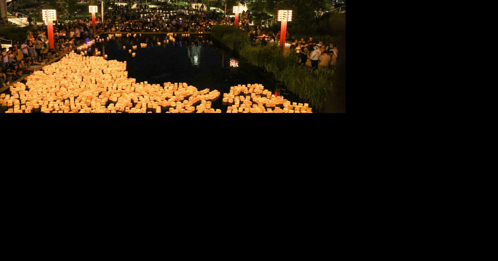 Photos Lanterns fill Gene Leahy Mall pond during Water Lantern Festival