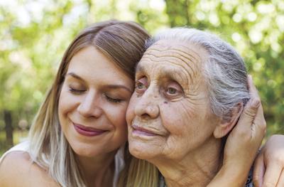 Hugging grandma in the park