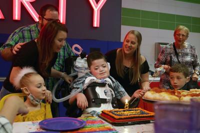 Lincoln DeLuna is seen with family and friends who gathered for his 8th birthday on Saturday, Dec. 18, 2021 in Wesley Chapel, Florida.