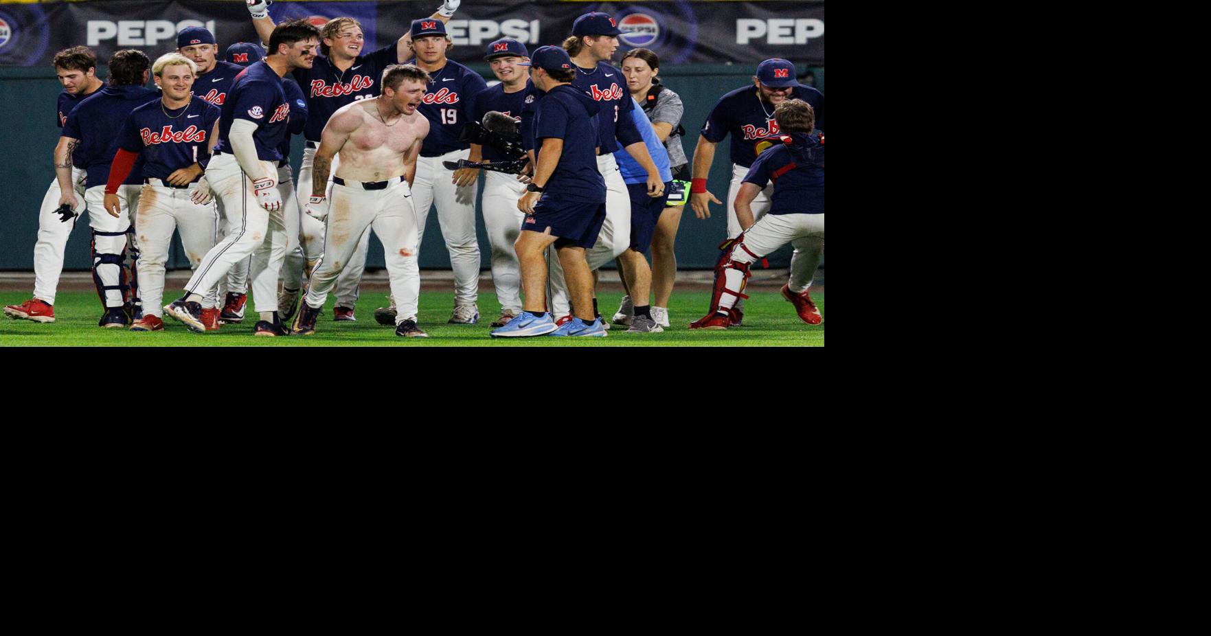Ole Miss baseball players celebrating their walk-off win over ASU