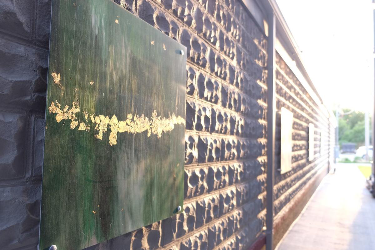 Elkhorn artist spends 2 years transforming 1915 gas station into home