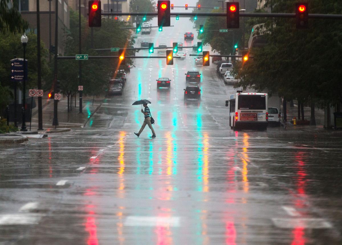 Drenched Omaha mops up the mess after breaking rainfall record ...