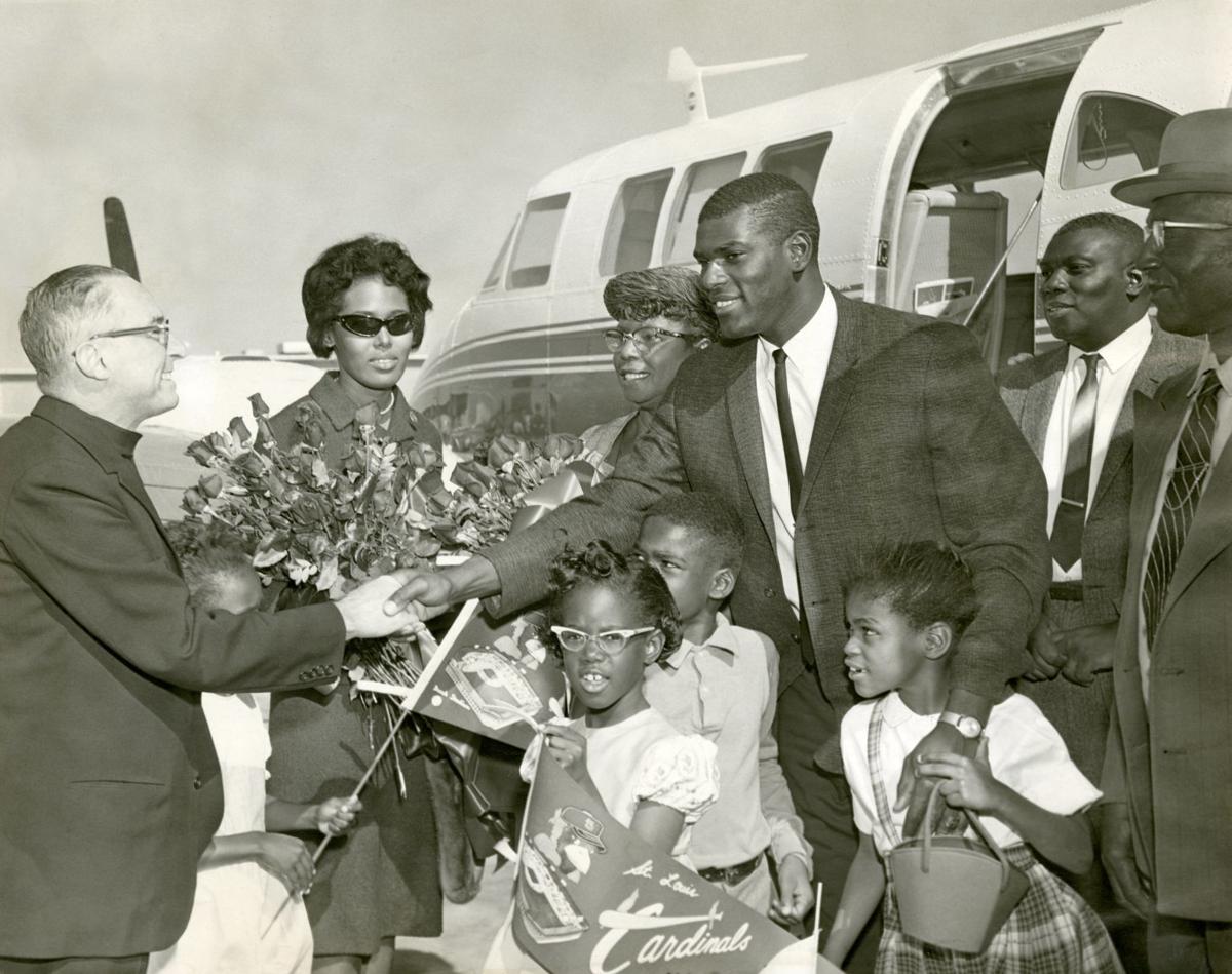 Bob Gibson and his wife, Charlene,with the 1965 Corvette awarded