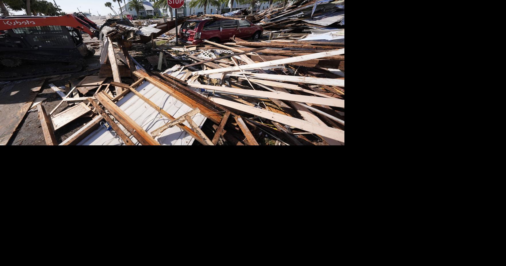 Rescuers race to free people trapped by Hurricane Helene after at least 30 ...