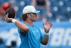 Tennessee quarterback Will Levis (8) throws during warmups before their preseason game against the Chicago Bears at Nissan