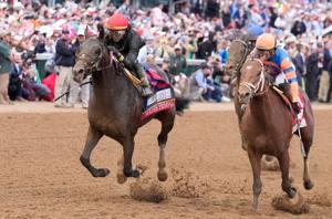 Golden Tempo (left), ridden by jockey Jose Ortiz, won the 152nd Kentucky Derby, May 2, 2026.