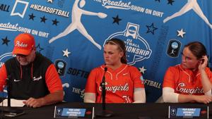 Oklahoma State's Kenny Gajewski and players after NCAA Super Regional game 1 loss to Nebraska