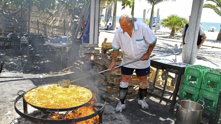 Ayo has been cooking up beachside paella for decades in Nerja, Spain. (Rick Steves, Rick Steves’ Europe)