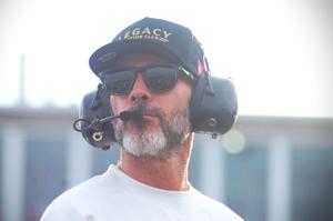 Seven-time NASCAR Cup Series champion and Legacy Motor Club co-owner Jimmie Johnson watches practice at North Wilkesboro Speedway on Saturday, July 18, 2026.