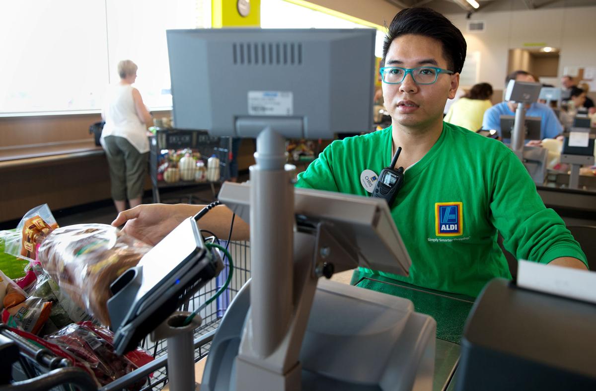Shoppers line up to check out deals at Omaha’s newest Aldi Money