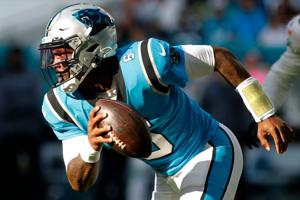Nov 28, 2021; Miami Gardens, Florida, USA; Carolina Panthers quarterback P.J. Walker (6) runs with the football against the Miami Dolphins during the fourth quarter at Hard Rock Stadium. Mandatory Credit: Sam Navarro-USA TODAY Sports