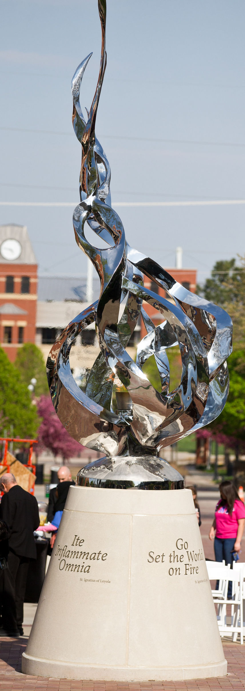 Creighton's new sculpture honoring Jesuits is 20 feet tall, features flame that will remain lit