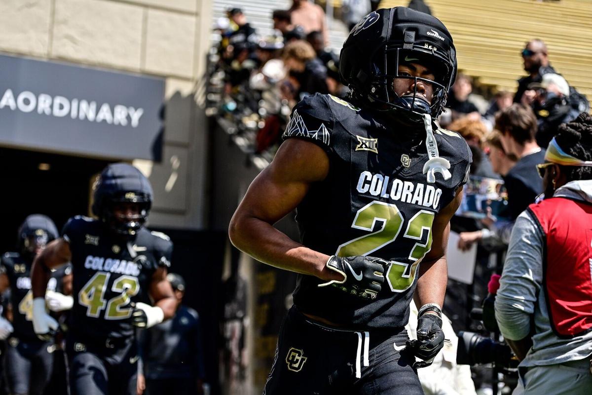 Colorado's Carter Stoutmire runs onto the field before the Black and Gold Spring Game at Folsom Field on April 19, 2025, in Boulder, Colorado.