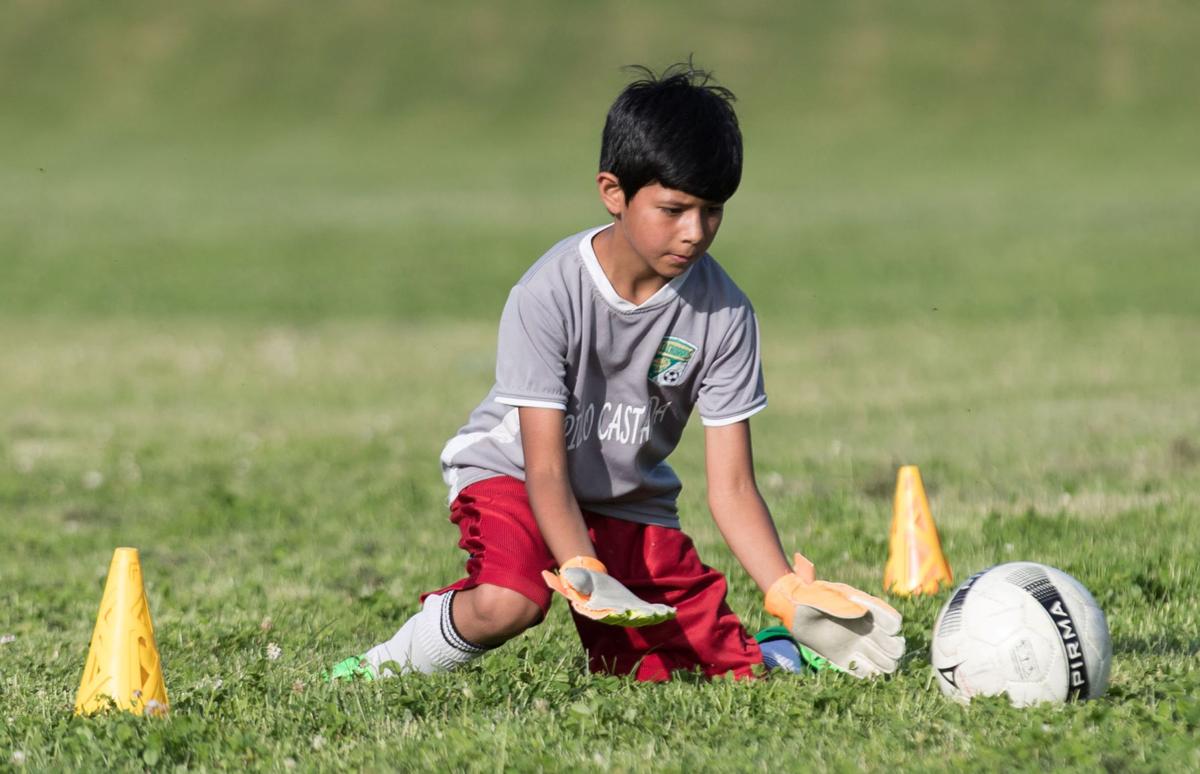 Girls on Omaha youth soccer team cut their hair in solidarity with