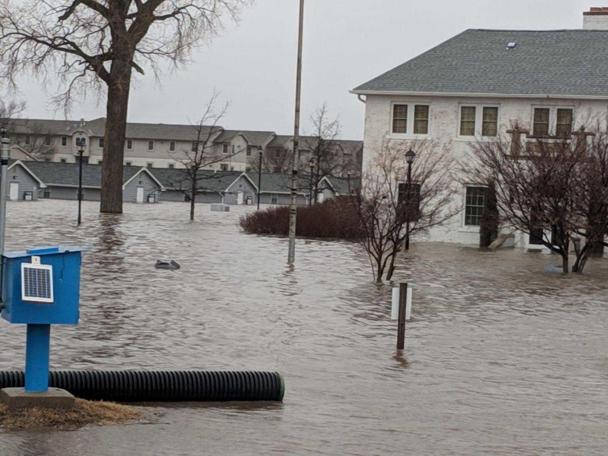 Military flooding woes Guard's Camp Ashland inundated; Offutt personnel filling sandbags