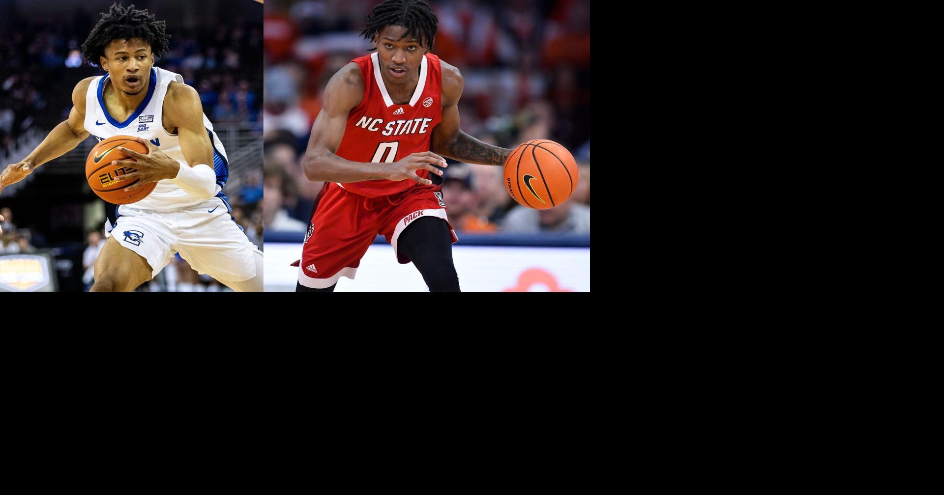 Creighton guard Trey Alexander, right, looks to pass the ball as North  Carolina State guard Jack Clark defends in the first half of a first-round  college basketball game in the men's NCAA