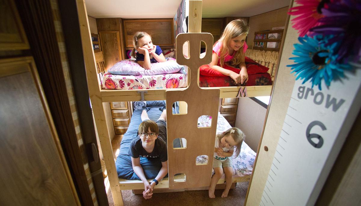 Family of 18 moves into an RV — just until its tiny houses are Family of 18 moves into an RV — just until its tiny houses are