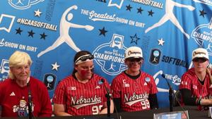 Nebraska's Rhonda Revelle and players after NCAA Super Regional win over Oklahoma State