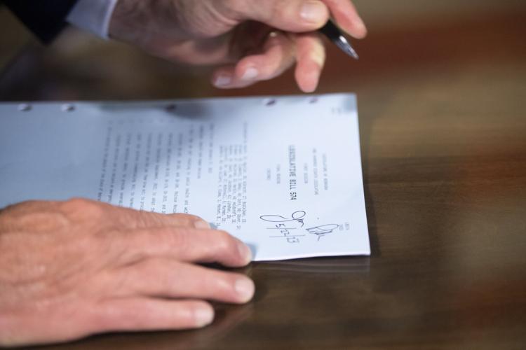 Gov. Pillen signs Nebraska's new abortion, trans health care restrictions  into law