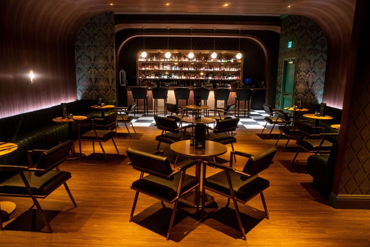 Fast cars, a secret bar room and concerts liven up Village Pointe building