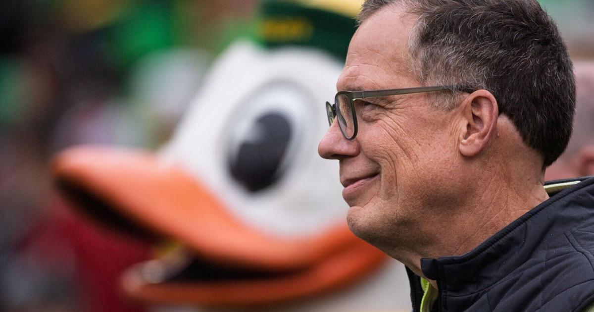 Oregon president grew up a Husker fan. Today, he’s rooting for the Ducks.