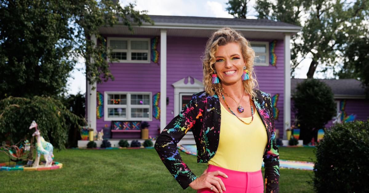 Why be boring? asks Omaha woman with purple house that's even more colorful inside