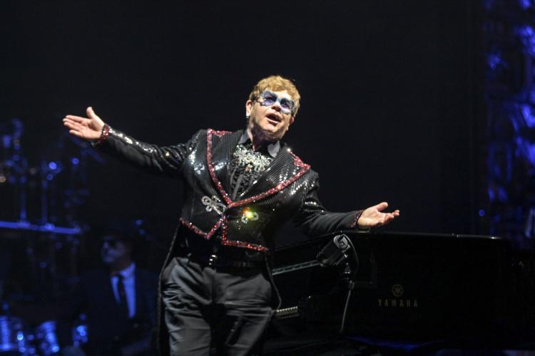 Remember all of Elton John's antics? Like the Donald Duck costume or  sequined Dodgers uniform?