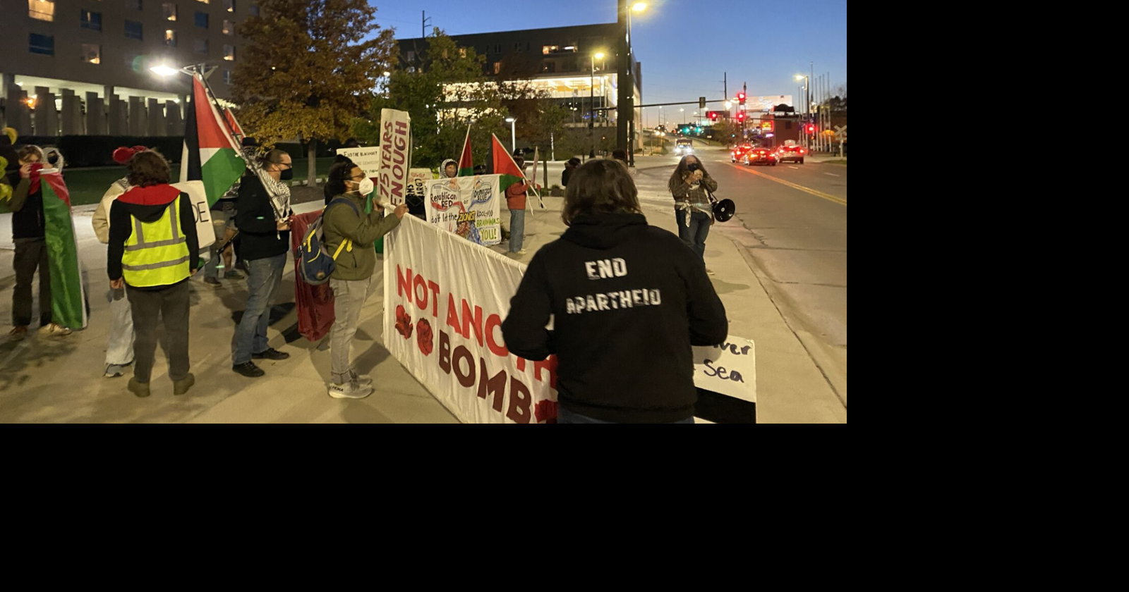 Dignitaries, protesters gather outside ahead of Joe Biden visit