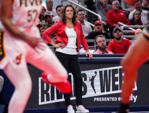 Indiana Fever head coach Stephanie White watches the game from the sideline on Tuesday, Aug. 11, 2026, during the game at