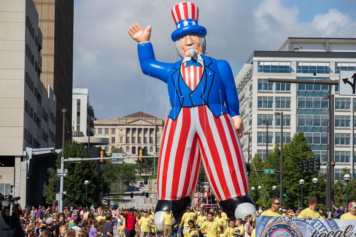 Septemberfest parade delights with plenty of balloons, floats, candy