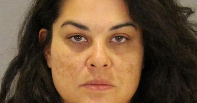 Woman accused of trying to run over airport officer held on $150,000 bail