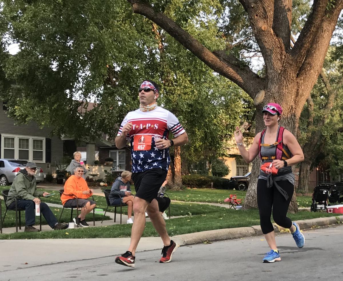 Arizona runner battles wind while blazing to course record in Omaha
