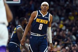 Mar 27, 2026; Denver, Colorado, USA; Denver Nuggets guard Peyton Watson (8) after making a basket during the second half against the Utah Jazz at Ball Arena.