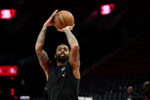 Dec 29, 2025; Portland, Oregon, USA; Dallas Mavericks guard D'Angelo Russell (5) warms up before a game against the Portland Trail Blazers at Moda Center. Mandatory Credit: Troy Wayrynen-Imagn Images