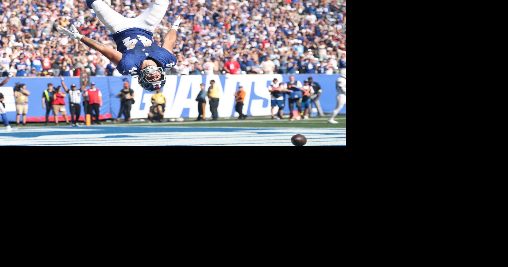 Sep 28, 2025; East Rutherford, New Jersey, USA; New York Giants running back Cam Skattebo (44) celebrates after scoring a two point conversion during the third quarter against the Los Angeles Chargers at MetLife Stadium. Mandatory Credit: Vincent Carchiett