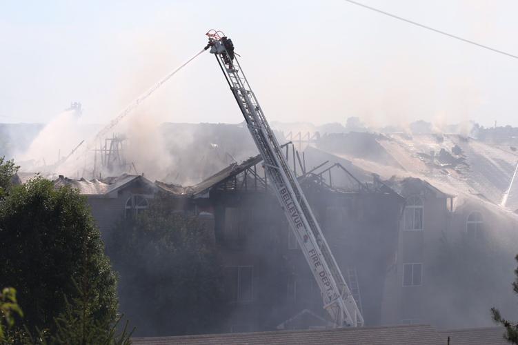 Firefighter, 2 others injured as roof collapses at Bellevue apartment fire