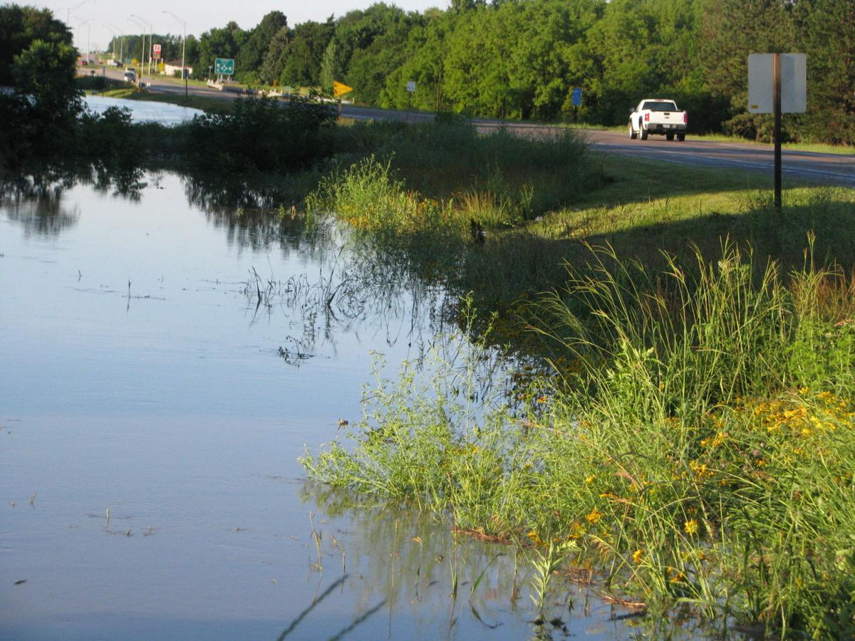 Floodwaters moving through Wood River, Nebraska State and Regional