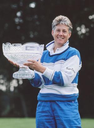 Patty Sheehan of the United States holds the champion golfer trophy after winning the Weetabix Women's British Open golf tournament on 15th August 1992 at the Woburn Golf and Country Club Duke's Course in Little Brickhill, near Milton Keynes, England