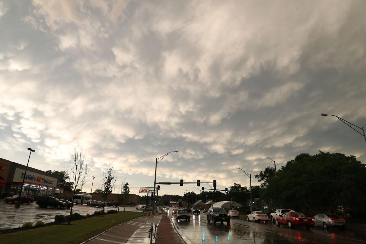Powerful storm splinters homes, knocks out power to thousands; two