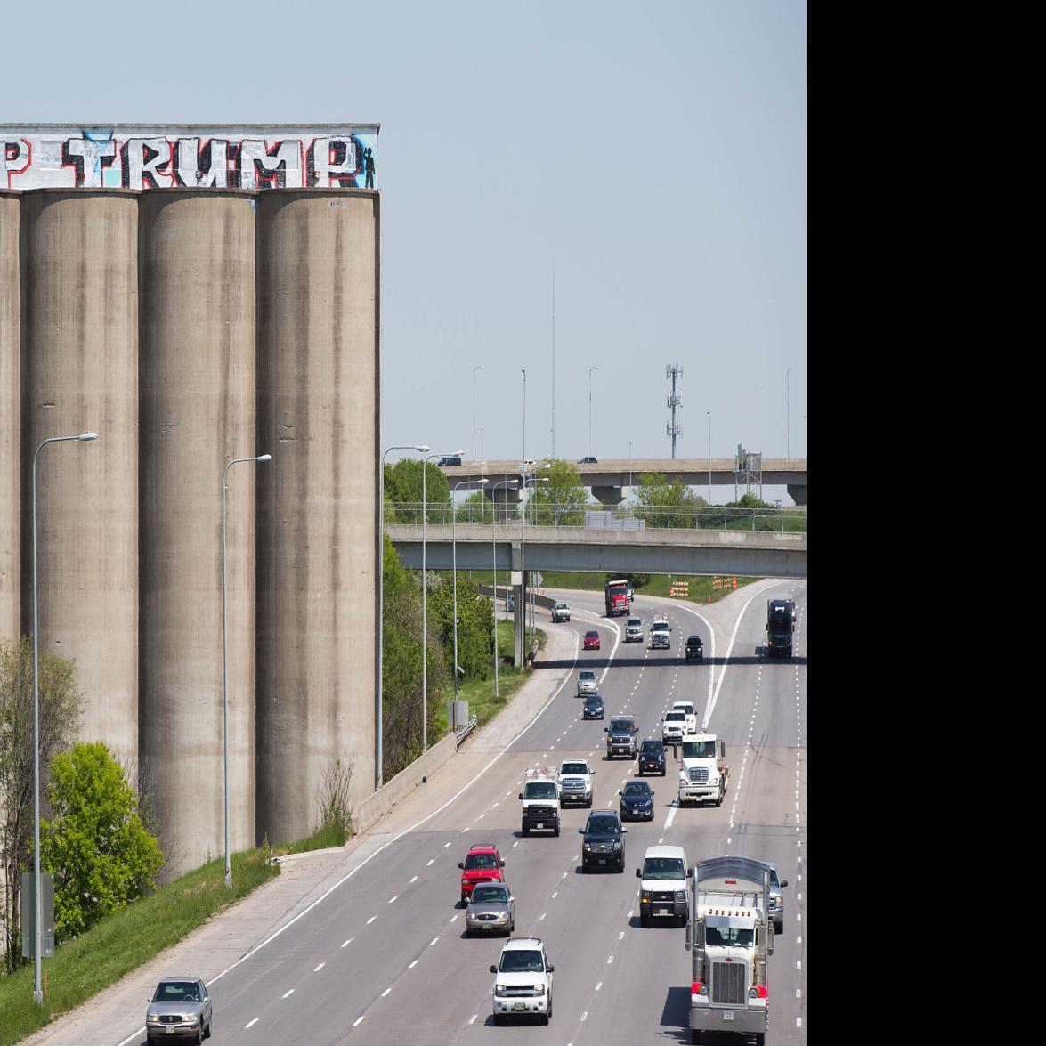 Ahead Of Omaha Rally Dump Trump Graffiti Appears Atop Grain Elevator Flanking I 80 State Regional Omaha Com
