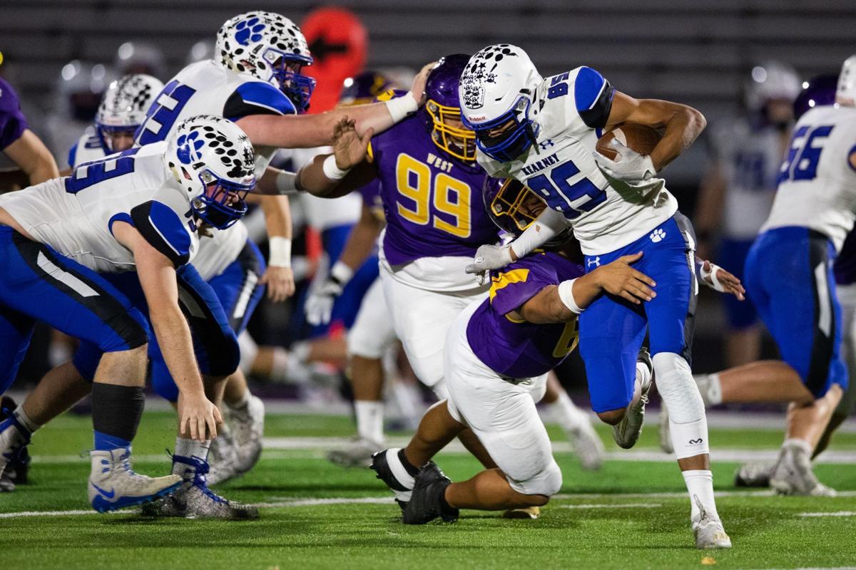 Class A football Kearney upsets Bellevue West in overtime to advance