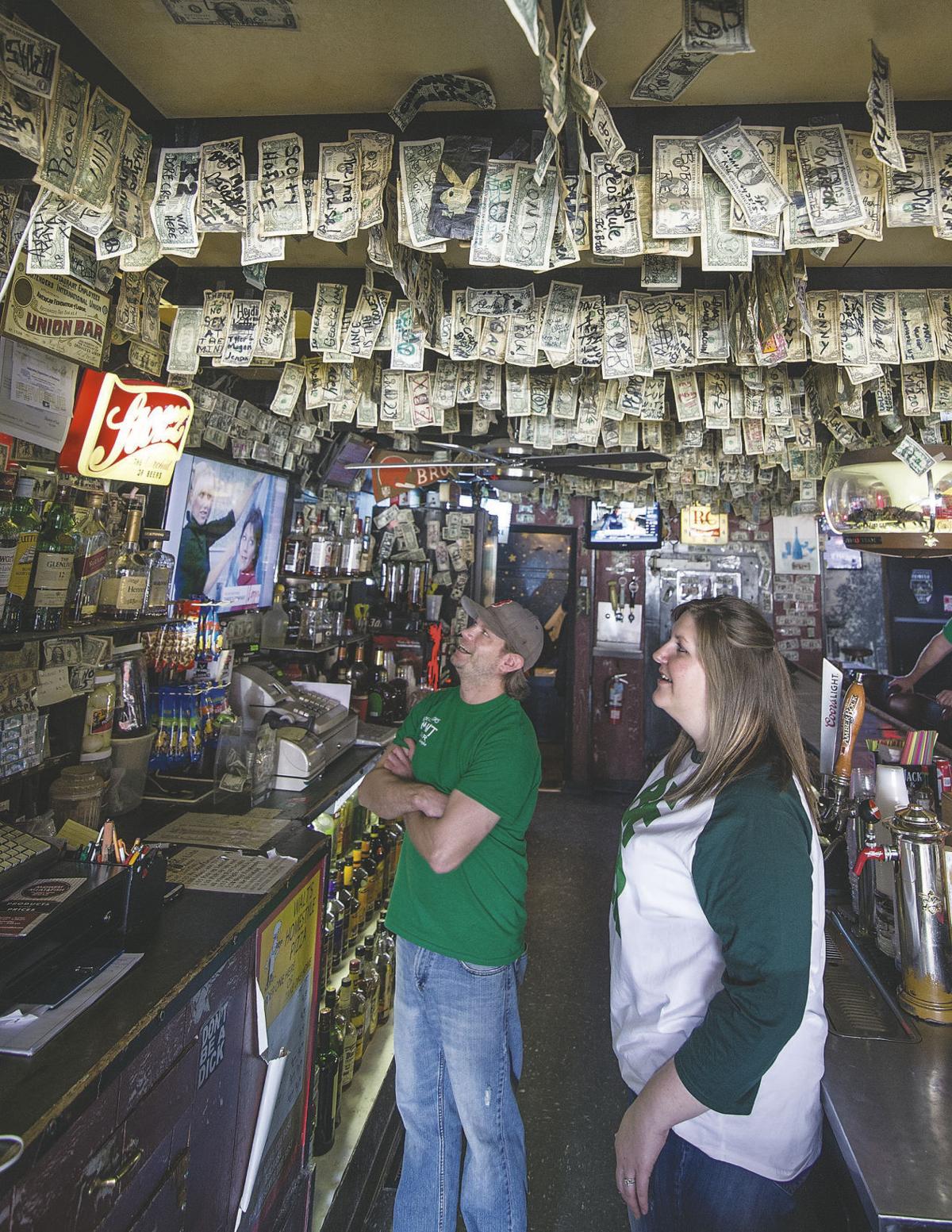 Patrons of Norfolk bar leave cash on the ceiling Nebraska