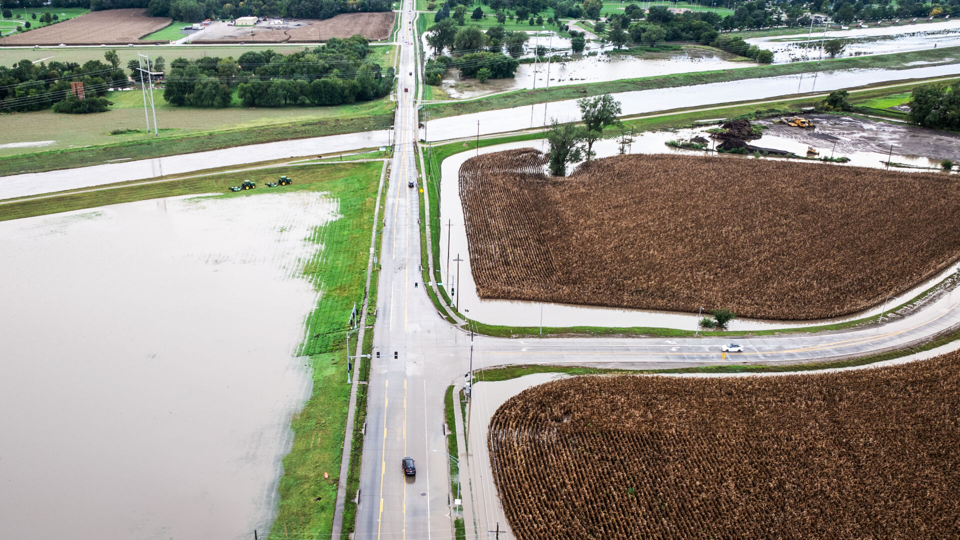 Car In Rai Photos: Heavy rain causes flooding in Omaha