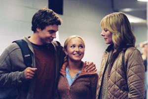 Trevor Blumas, from left, Hayden Panettiere and Kim Cattrall appear in a scene from "Ice Princess."