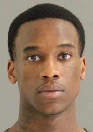 Former classmate and friend wanted in connection with March slaying of